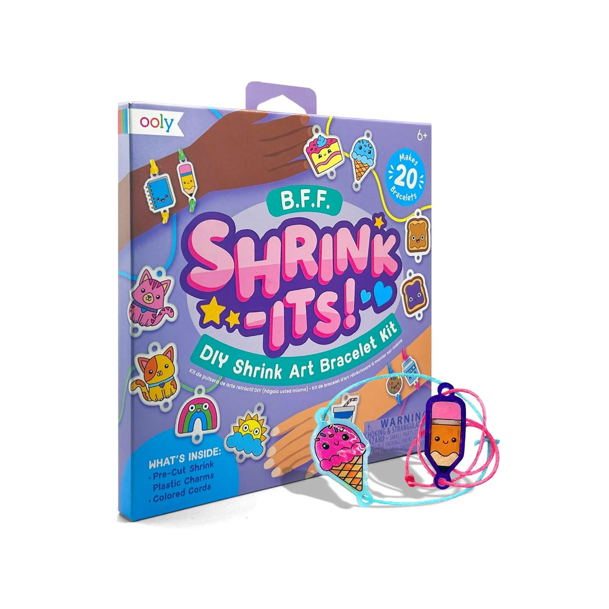 Packaging for &#39;Shrink-Its! DIY Shrink Art Bracelet Kit&#39; featuring illustrations of colored charms and hands creating bracelets, with product information and branding.