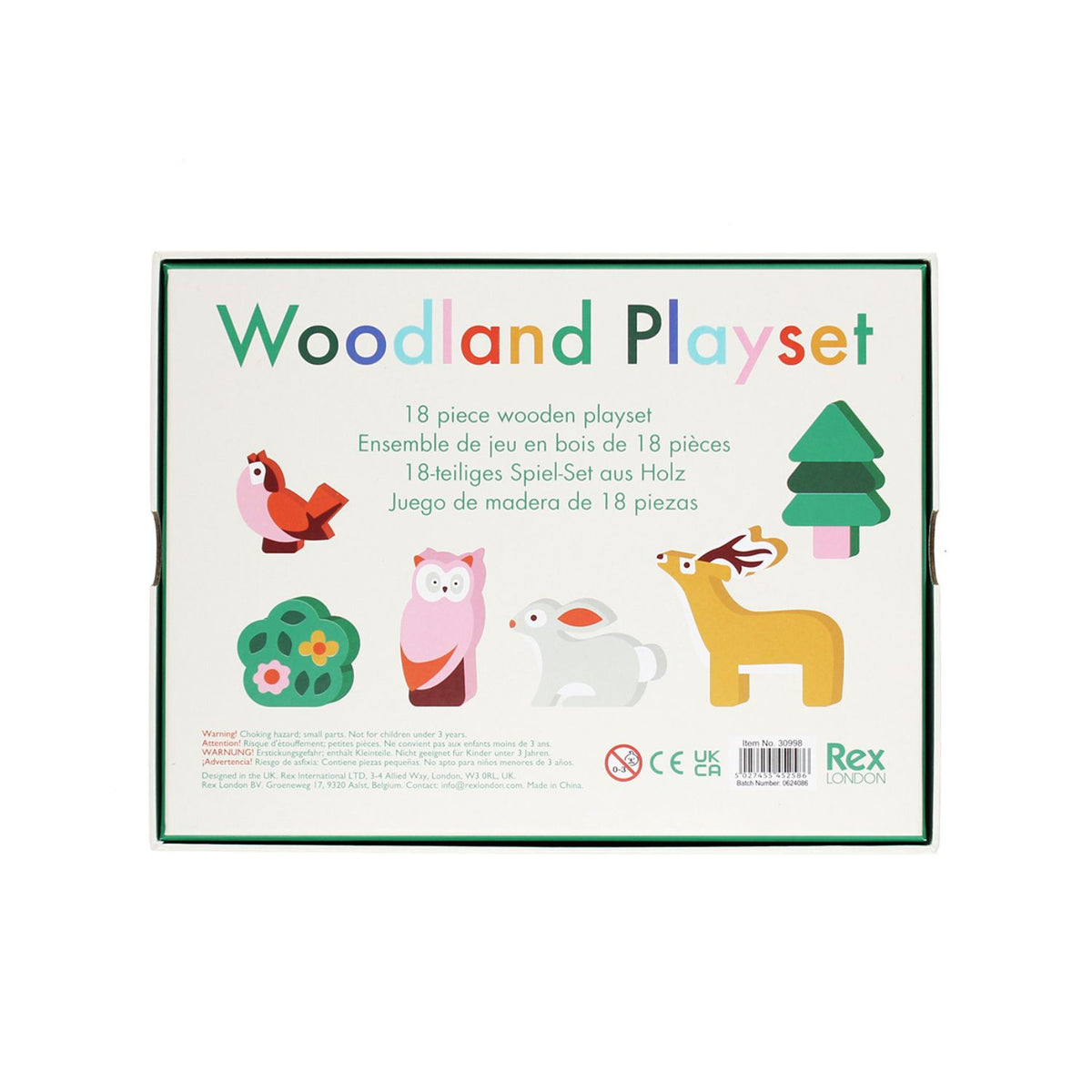 A collection of wooden woodland creature toys and forest scenery arranged for play, designed to help children learn about natur