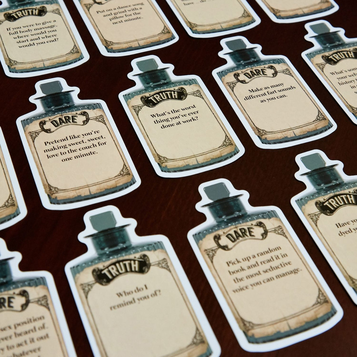 Set of 'Dare' and 'Truth' cards on a brown background