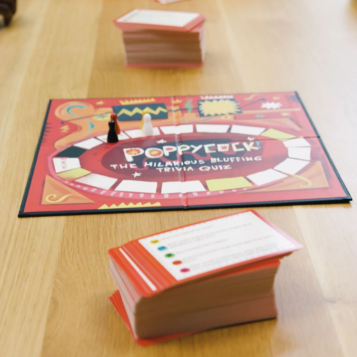 Board game with cards on a wooden surface