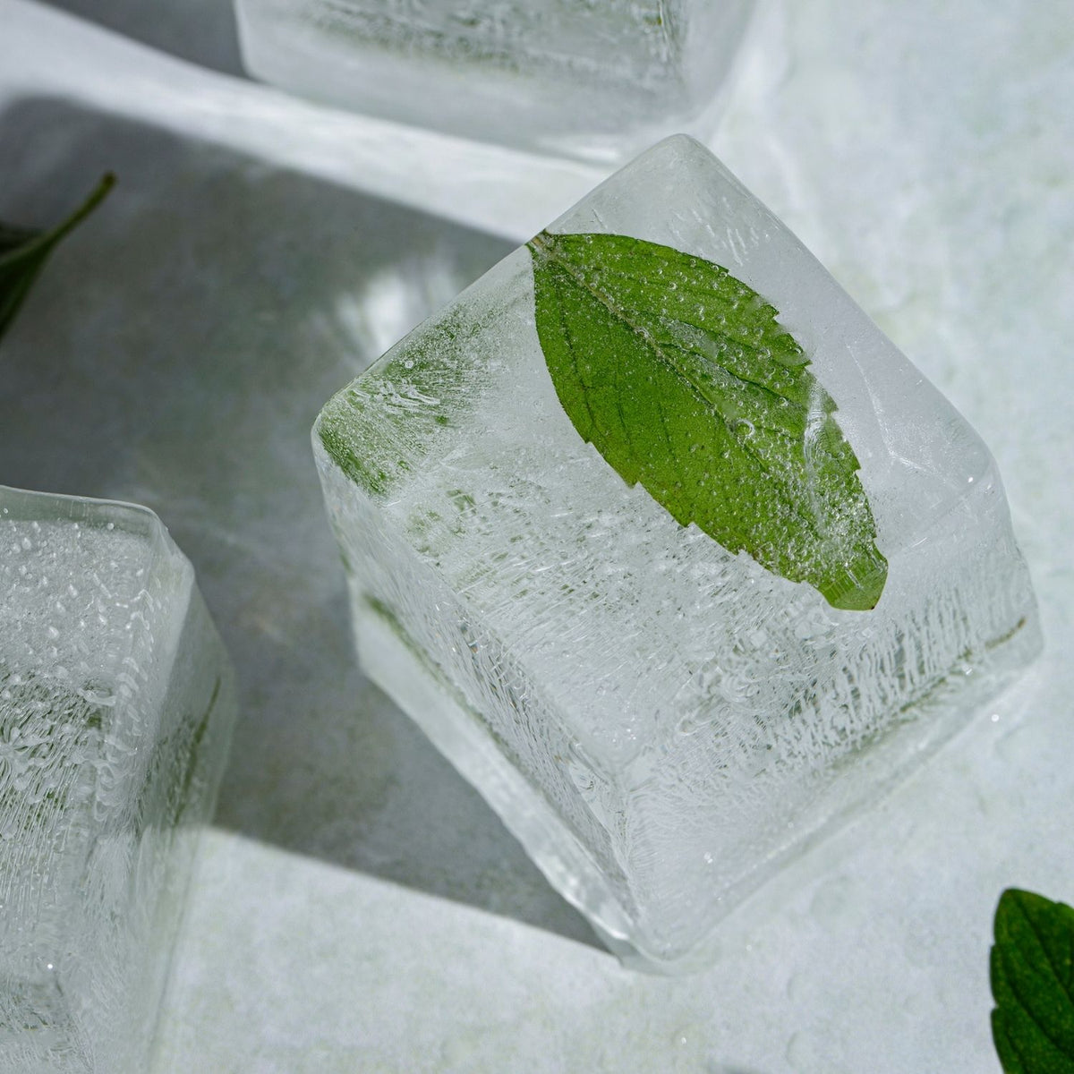 A jumbo ice cube mould showing nine perfectly square, oversized cubes that provide a premium look for high-end cocktails and spirits.