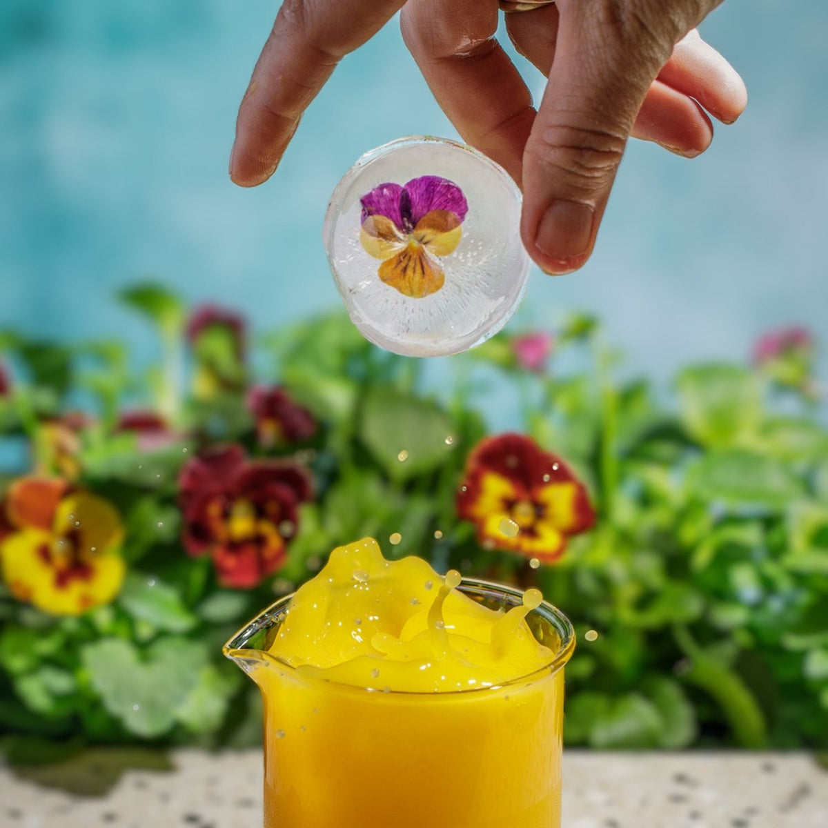 Elevate your drinks with this silicone ice sphere tray. Creates four large 45mm spheres perfect for whisky or cocktails. BPA-free and dishwasher safe.