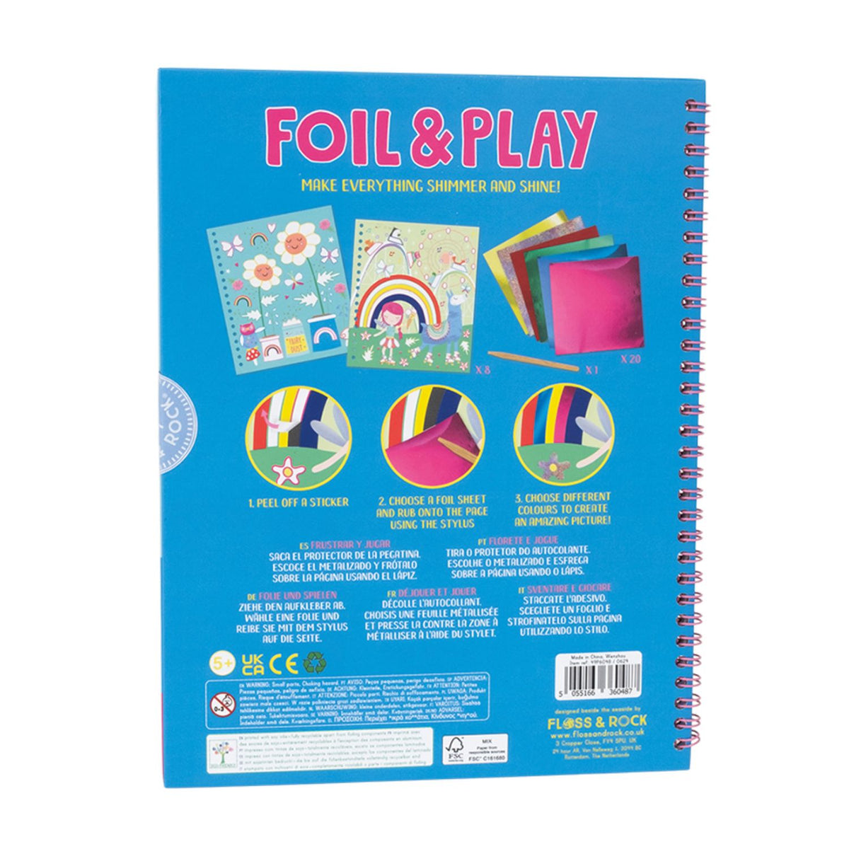 The back of the unicorn book displaying the FSC-certified logo and soy-based ink label with illustrations of fairies and rainbow. It includes a wooden stylus and color foiling sheets.