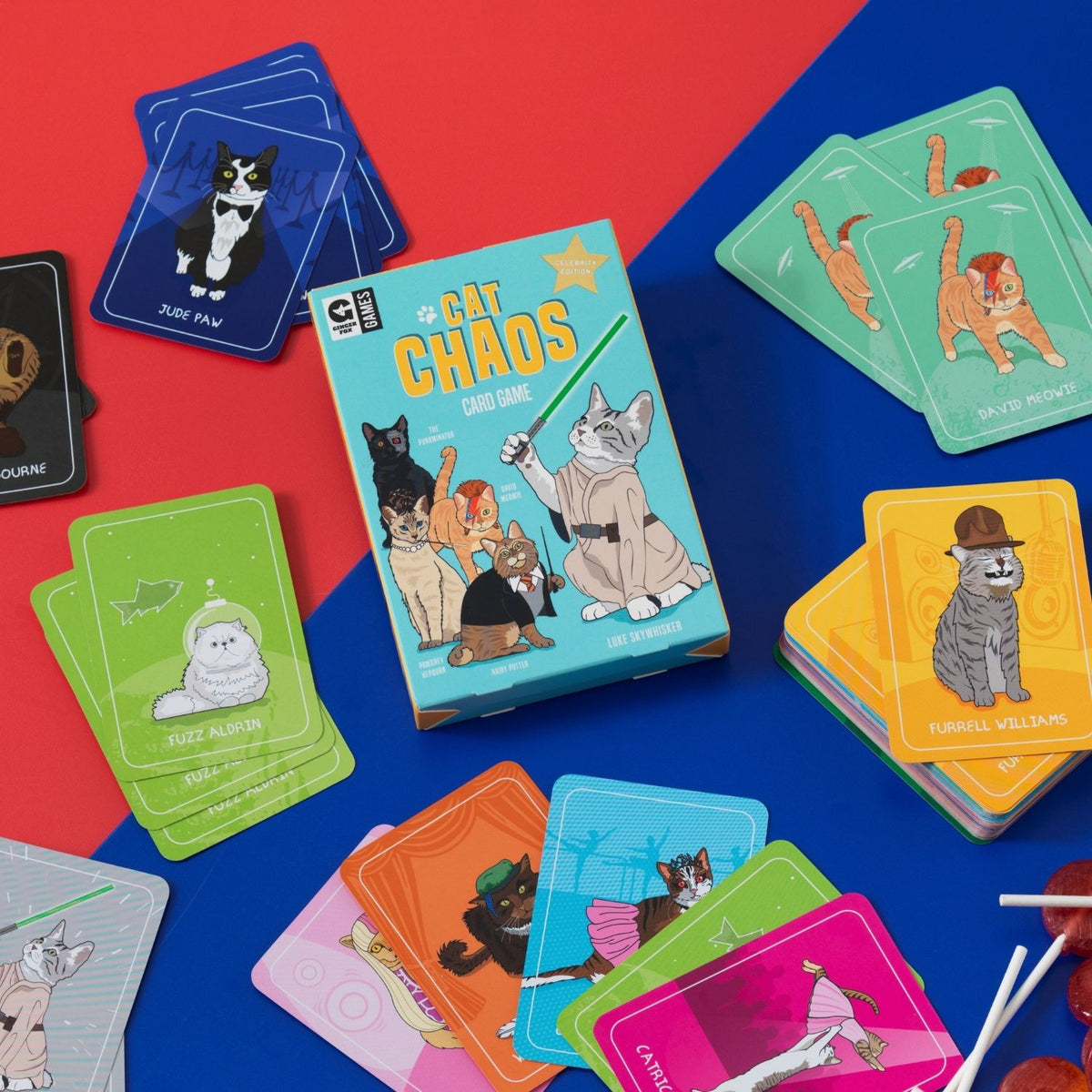 Cat-themed card game with colorful cards on a red and blue background