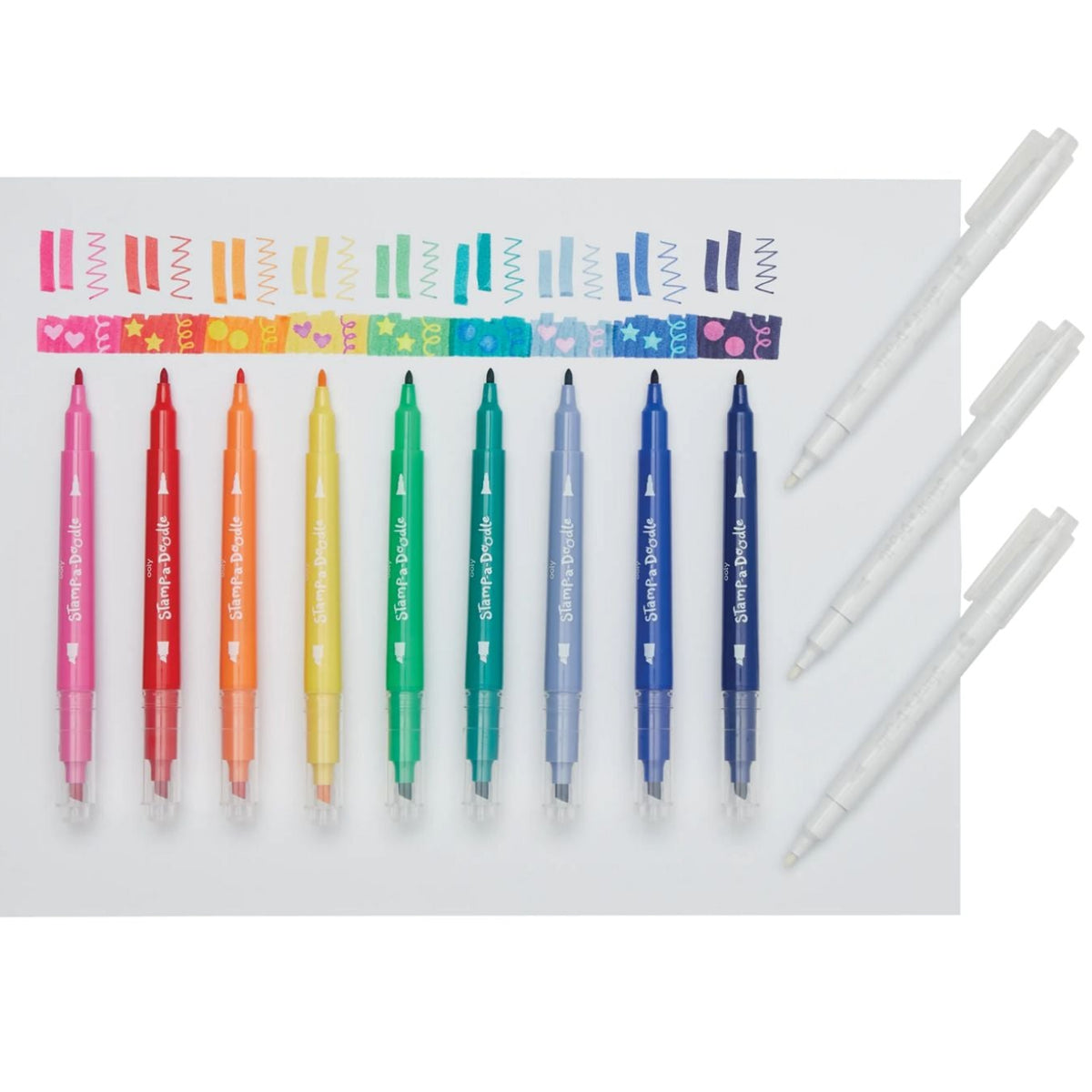 close-up of the three colour-changing markers showing the point tip on one end and the star, heart, and circle stamp nibs on the other.