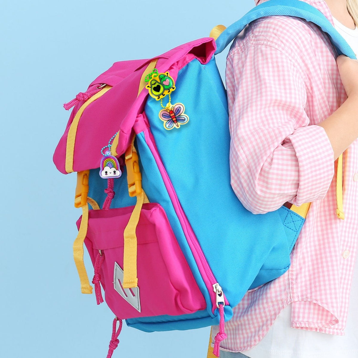 Colorful backpack with decorative elements on a blue background