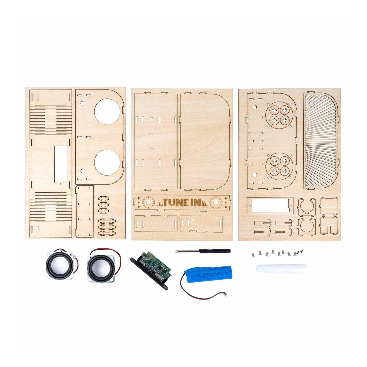 Wooden laser-cut kit components and internal electronic components, including the Bluetooth receiver and speaker driver, laid out alongside the wooden interlocking pieces.