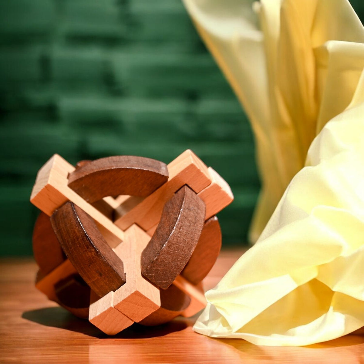 A close-up of the wooden Compass puzzle, showing the intricate interlocking pieces inspired by ancient Chinese directional tools.