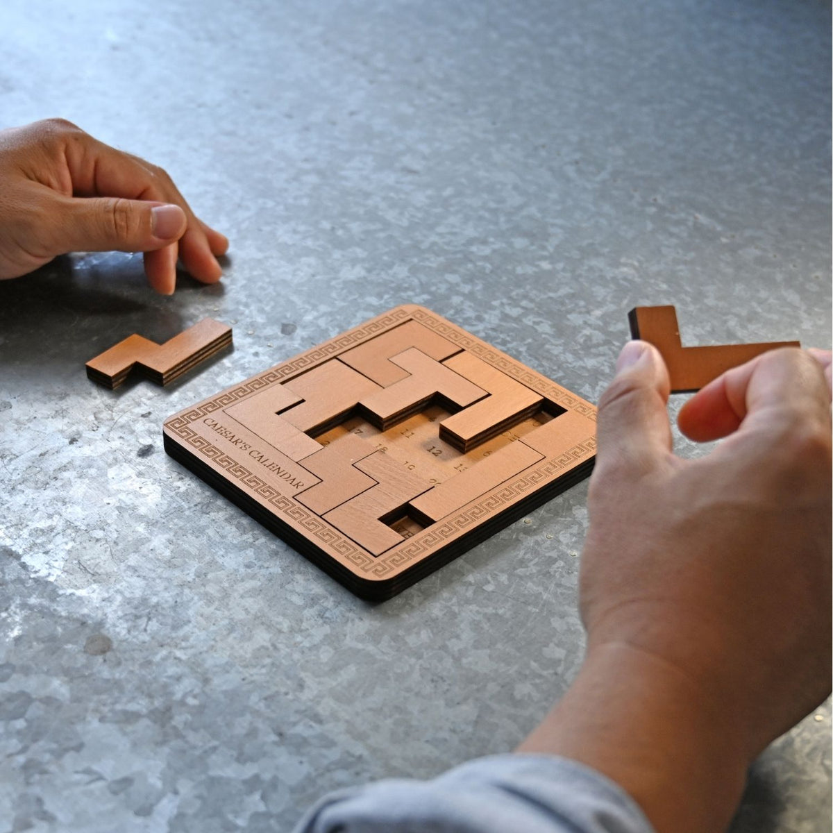 A level four educational logic wooden puzzle that provides a daily brain workout. Arrange the blocks to reveal today's date. Great for ages eight plus.