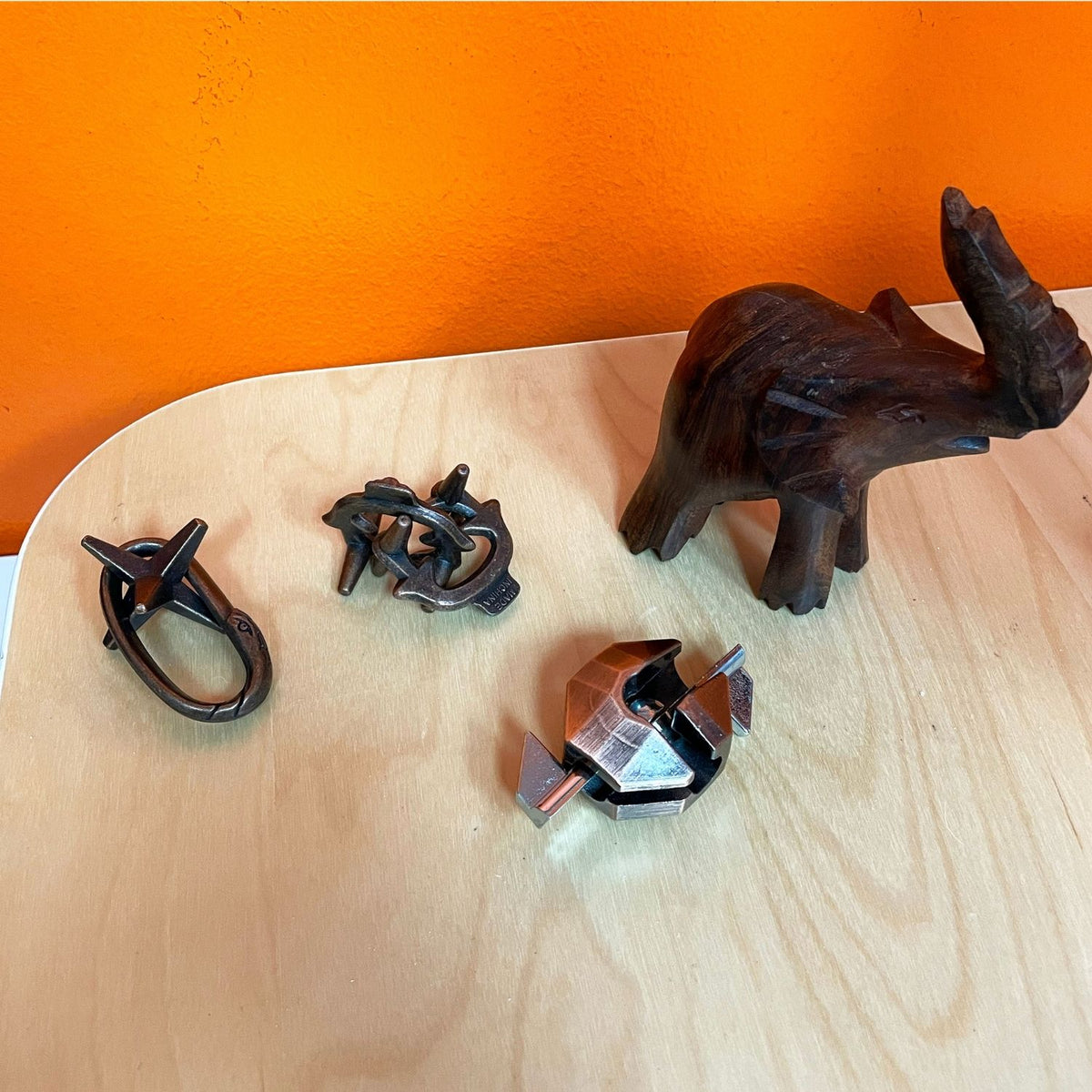 A Viking Forge three-pack puzzle set featuring three distinct metal disassembly challenges: the Star Gouge, Steel Mold, and Forging Tongs.